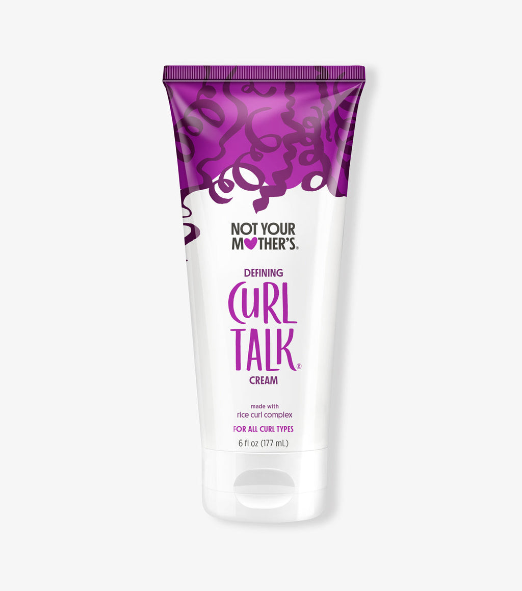 Define curls without the fragrance and proten using NYM Curl Talk Curl Cream.