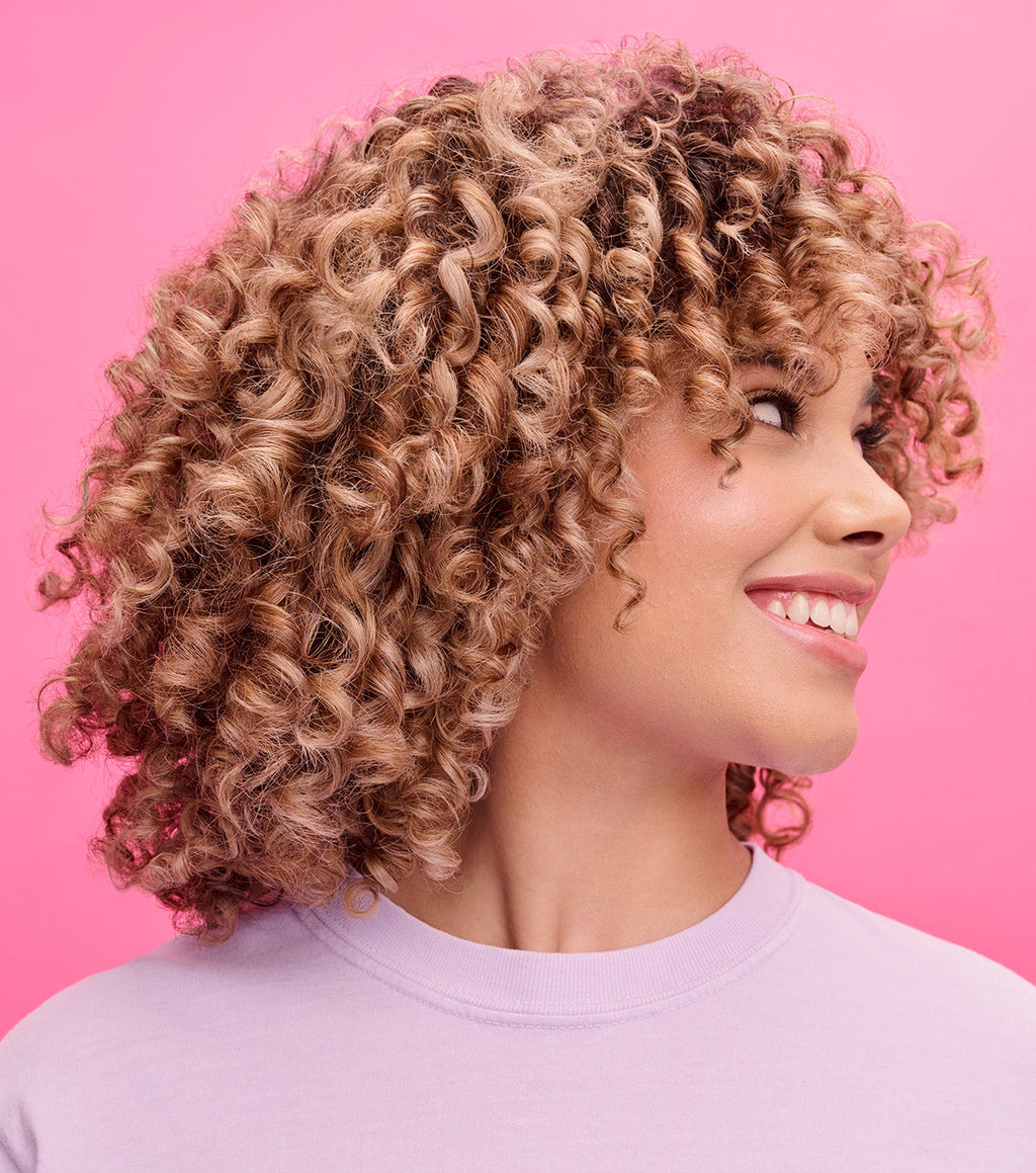 Keep your curls bouncy and uniform with Not Your Mother's hair care.